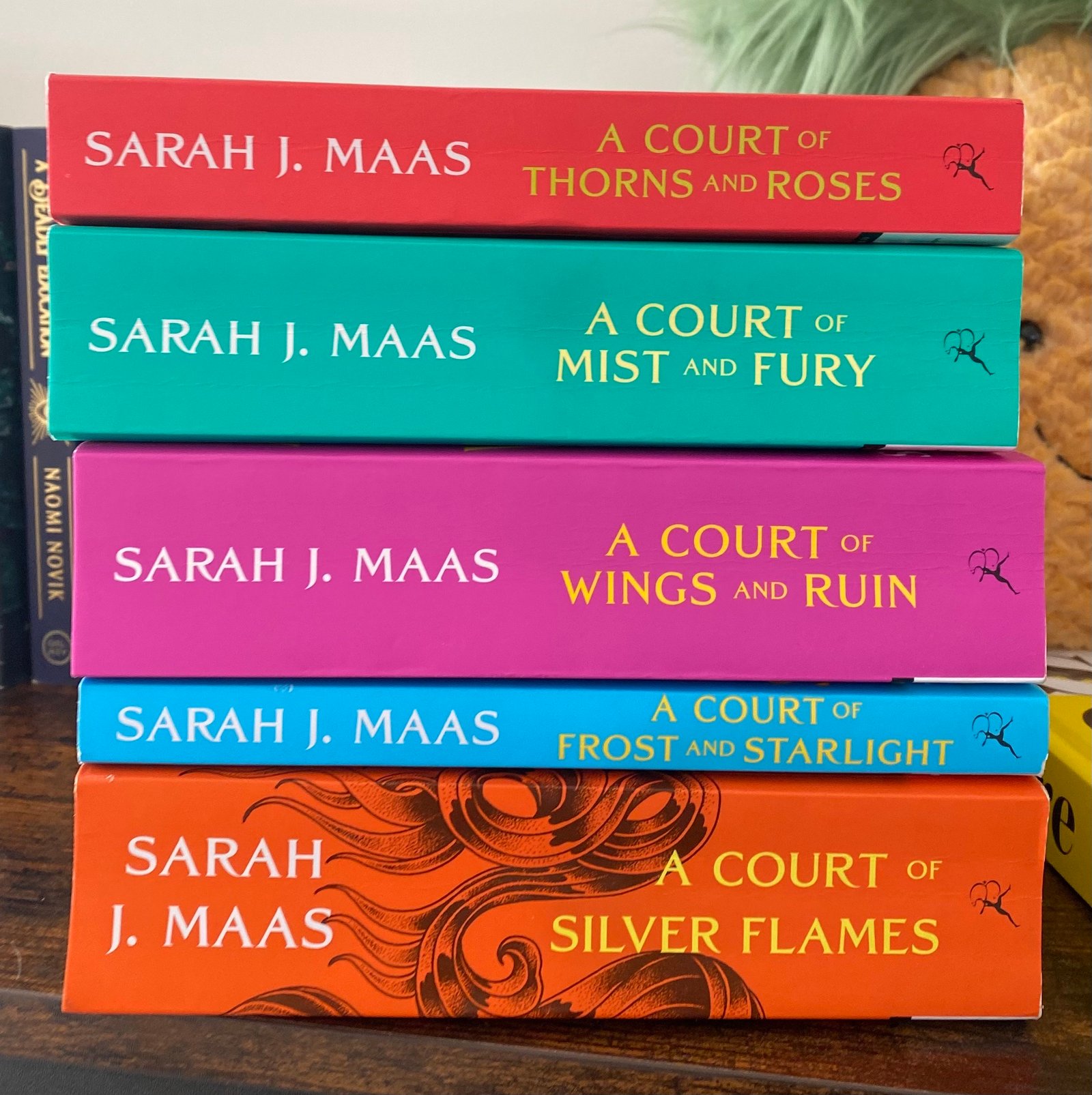 All ACOTAR books stacked on top of each other